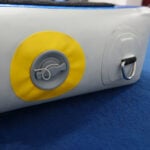 A closeup of the corner of the Power Launch, showing the valve and a D-ring.