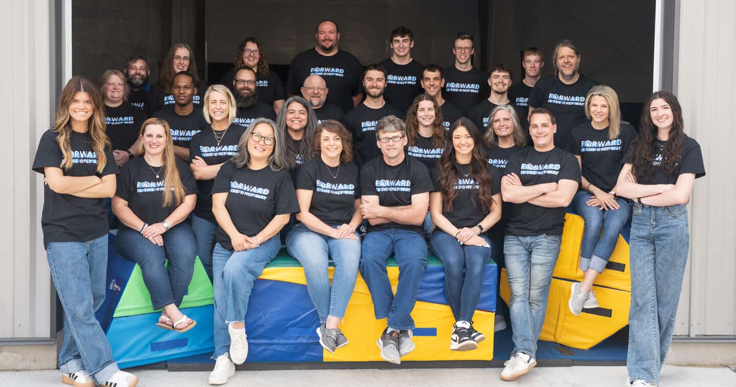 A group photo of the Tumbl Trak / Grow Through Movement team.