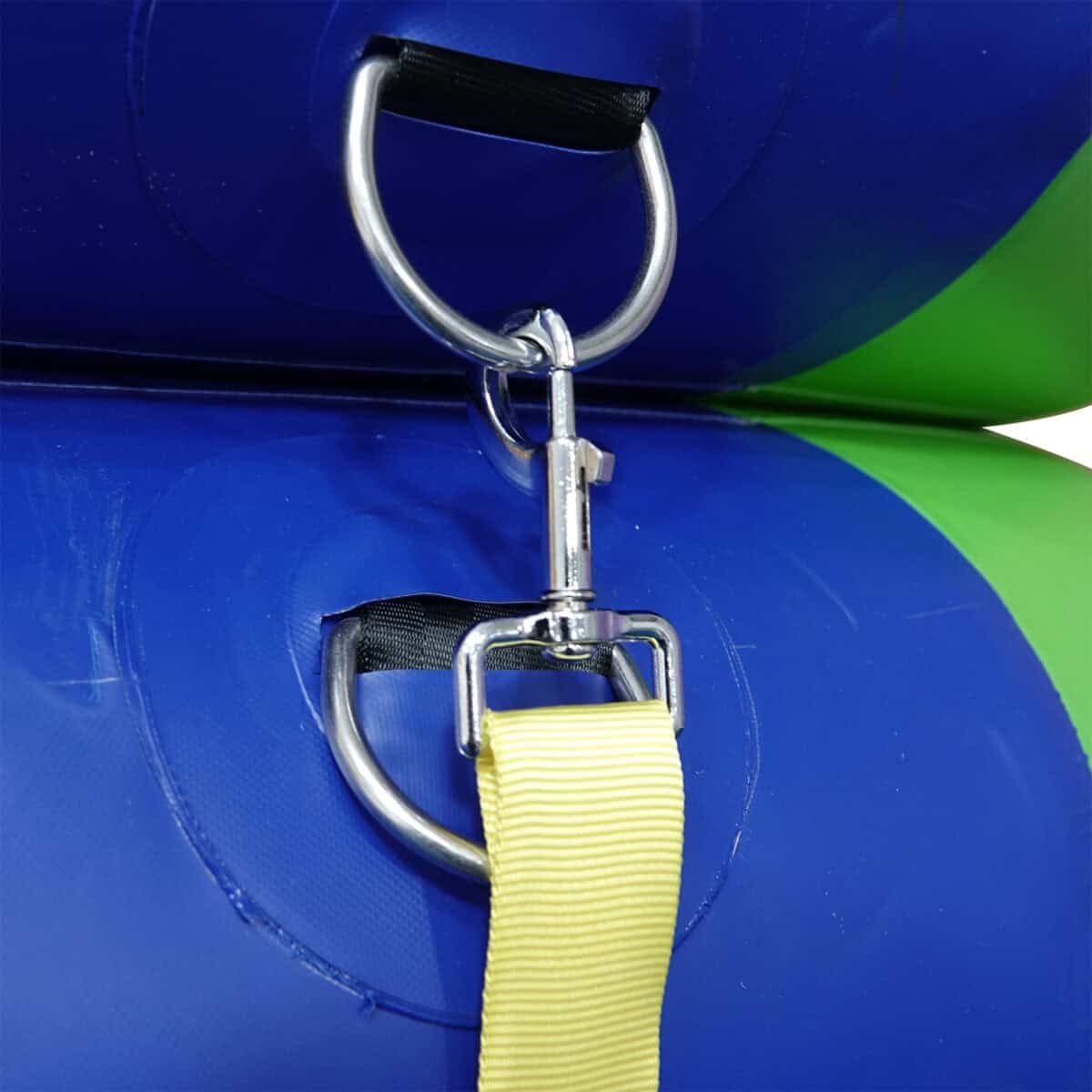 A closeup photo of a strap from the Fitness Wheel Hammock attached to a Fitness Wheel's d-ring.